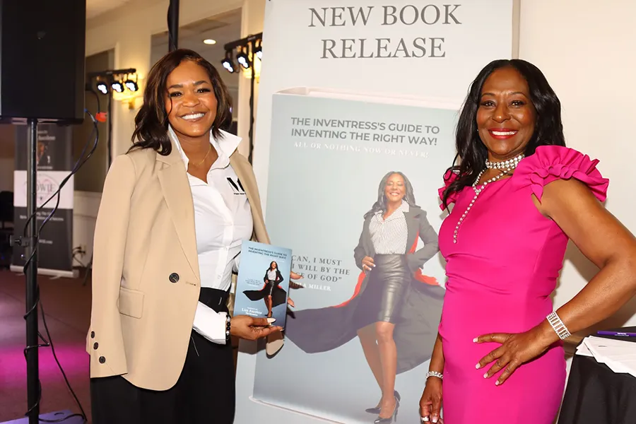 lisa ascolese with book banner and lady with book in hands